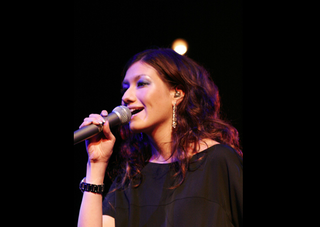 Vocalist Emi Evans, who just happens to be in all of my favorite things.
